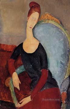  hebuterne - portrait of jeanne hebuterne in a blue chair 1918 Amedeo Modigliani